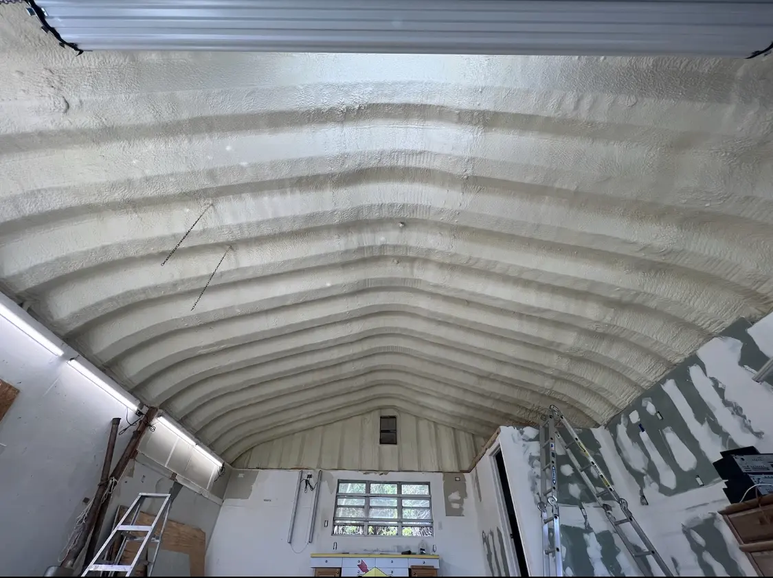 Spray polyurethane foam applied to the underside of a metal roof deck in Cedar Hills